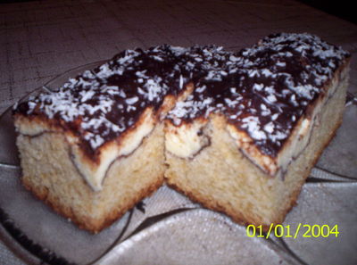 Ciasto z serem. polewa czekoladowa smarowana na gorące ciasto.
