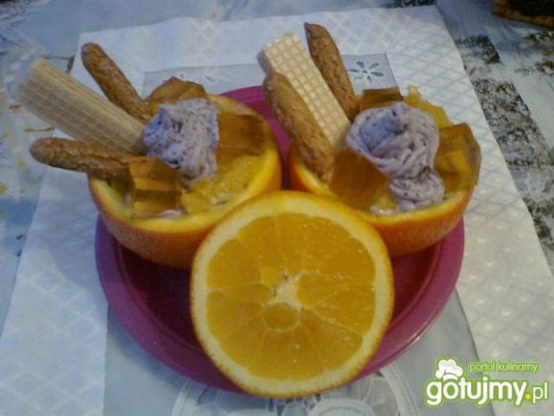 Przepis  deser w pomarańczach z nutą jagodową przepis